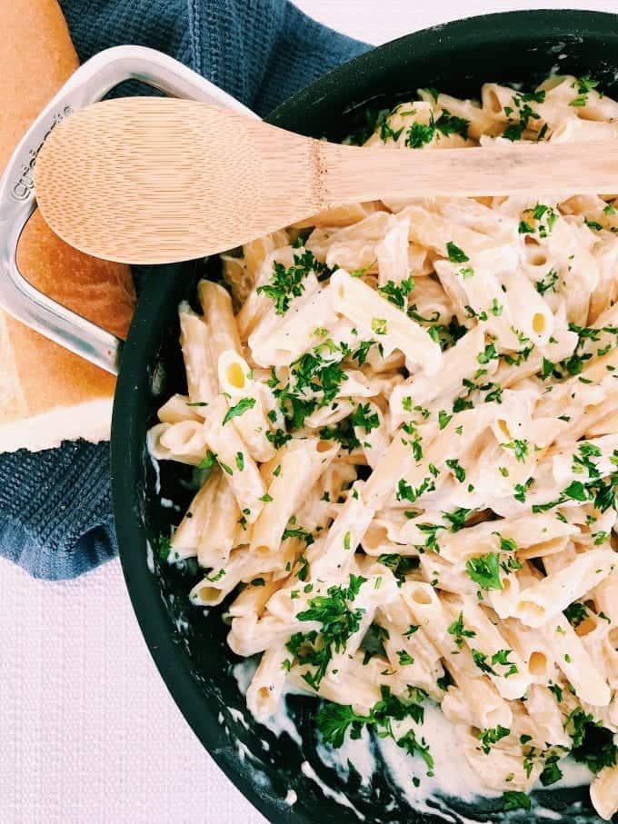 Large pan of pasta with alfredo sauce, an easy recipe for RV cooking.