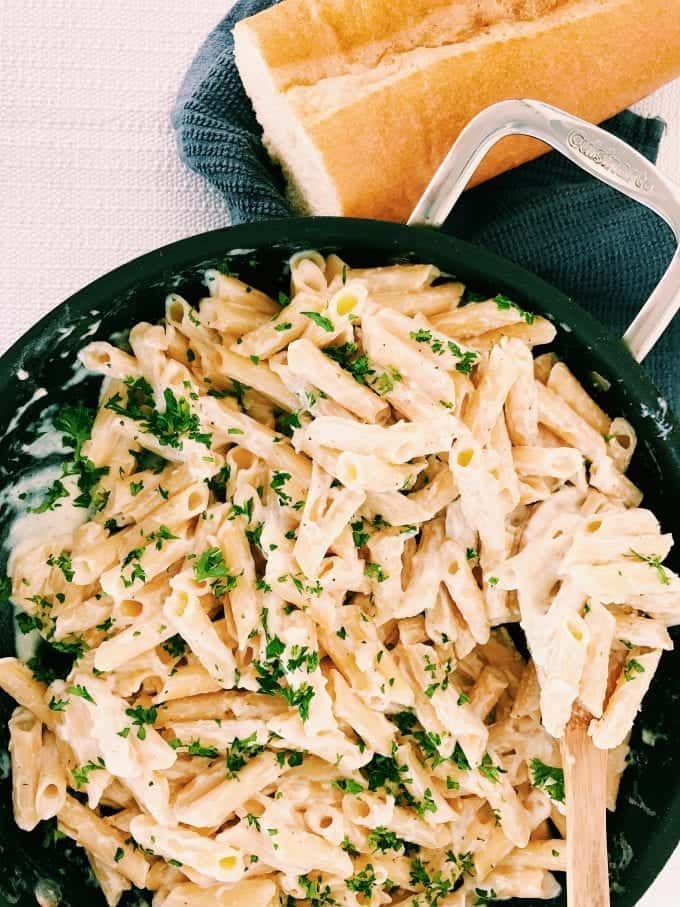 Penne pasta with cheesy alfredo sauce