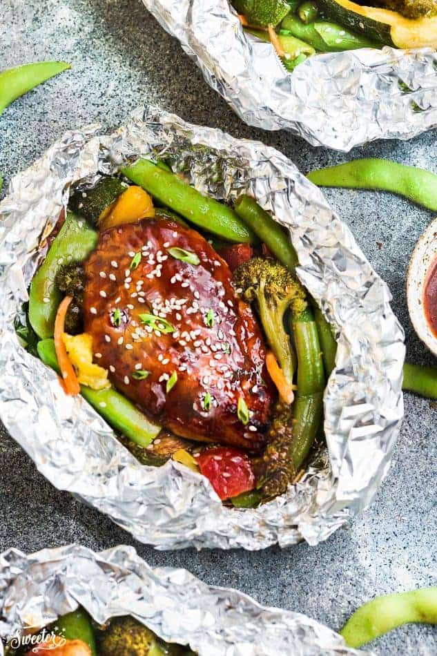 Teriyaki marinated chicken with vegetables in foil packet