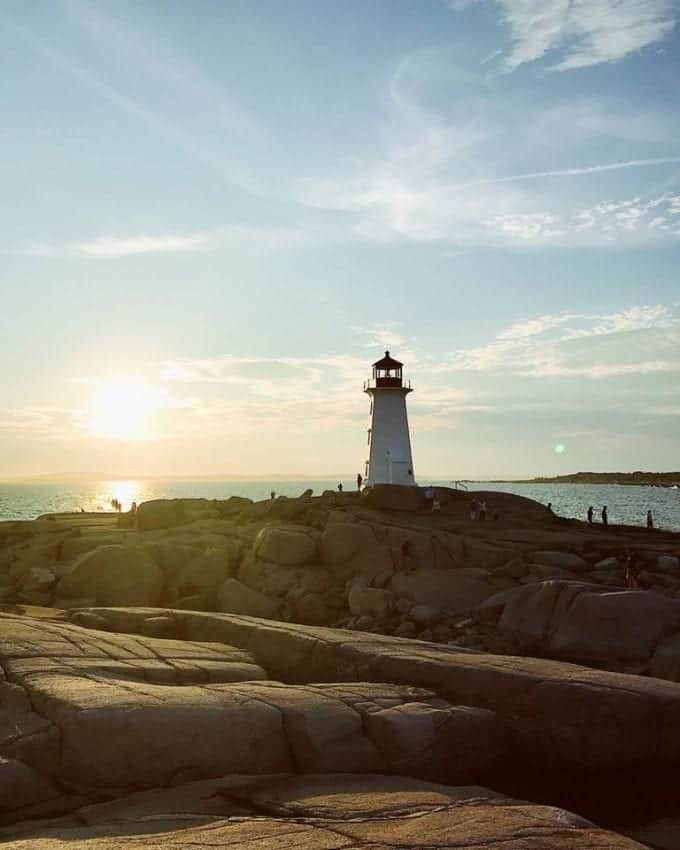 Lighthouse on rocky hill in Nova Scotia