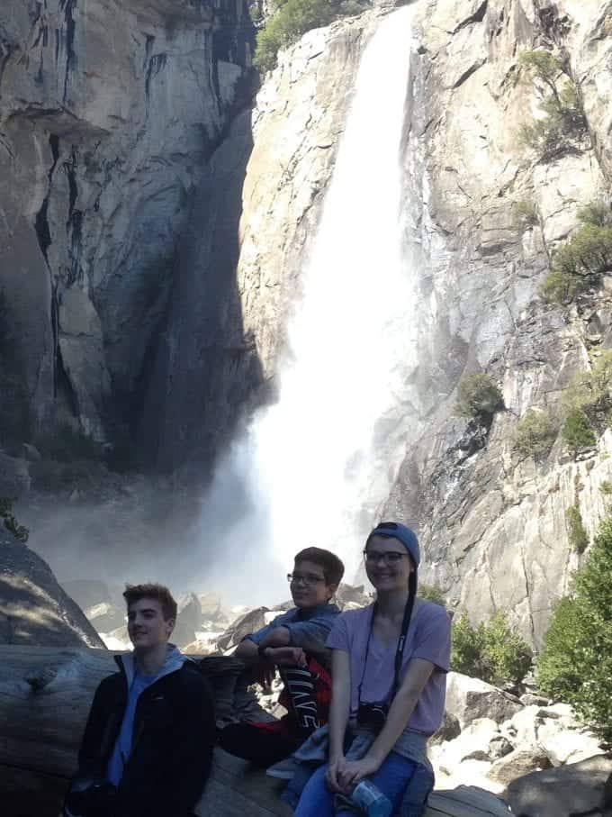 My three kids in front of a beautiful waterfall in Yosemite National Park in the Spring.