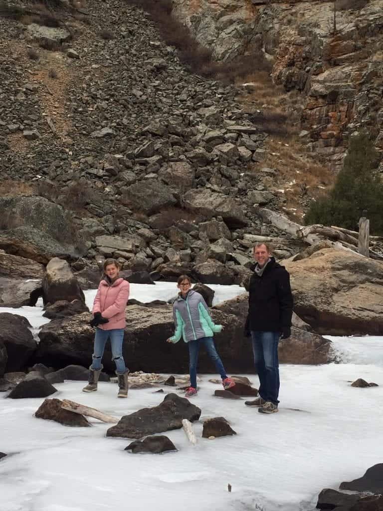 Playing on the frozen river in Poudre Canyon