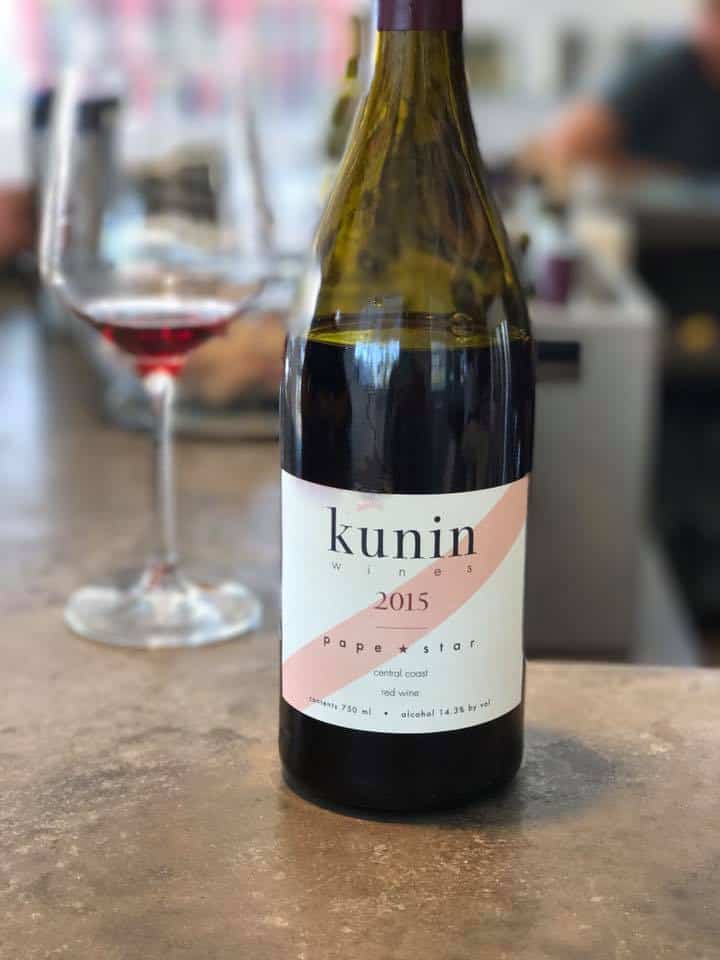 Bottle of wine during tasting at Kunin Winery