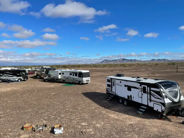 Line of RVs camping on public lands in Arizona, which is called boondocking.