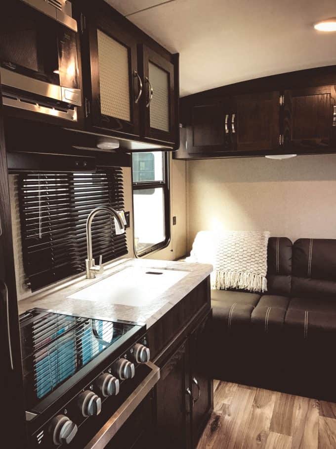 Interior kitchen area of Keystone Springdale travel trailer