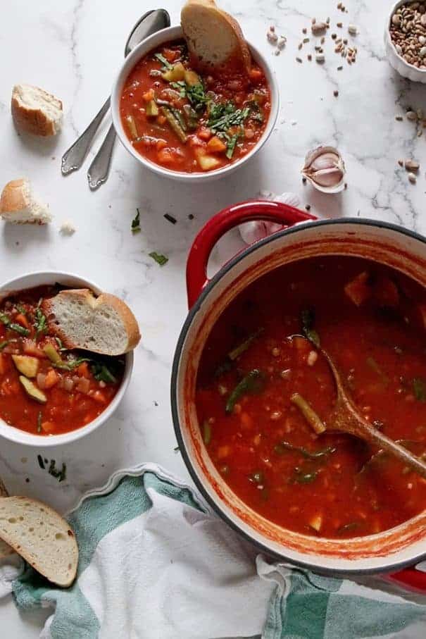 Minestrone soup served from dutch oven.