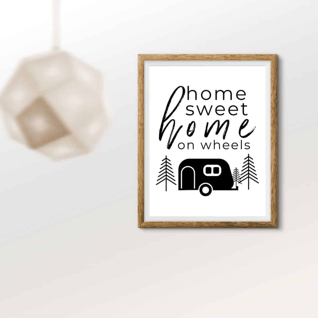 Camper RV with text 'home sweet home' in frame
