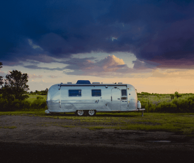 Airstream trailer for rent parked at campsite