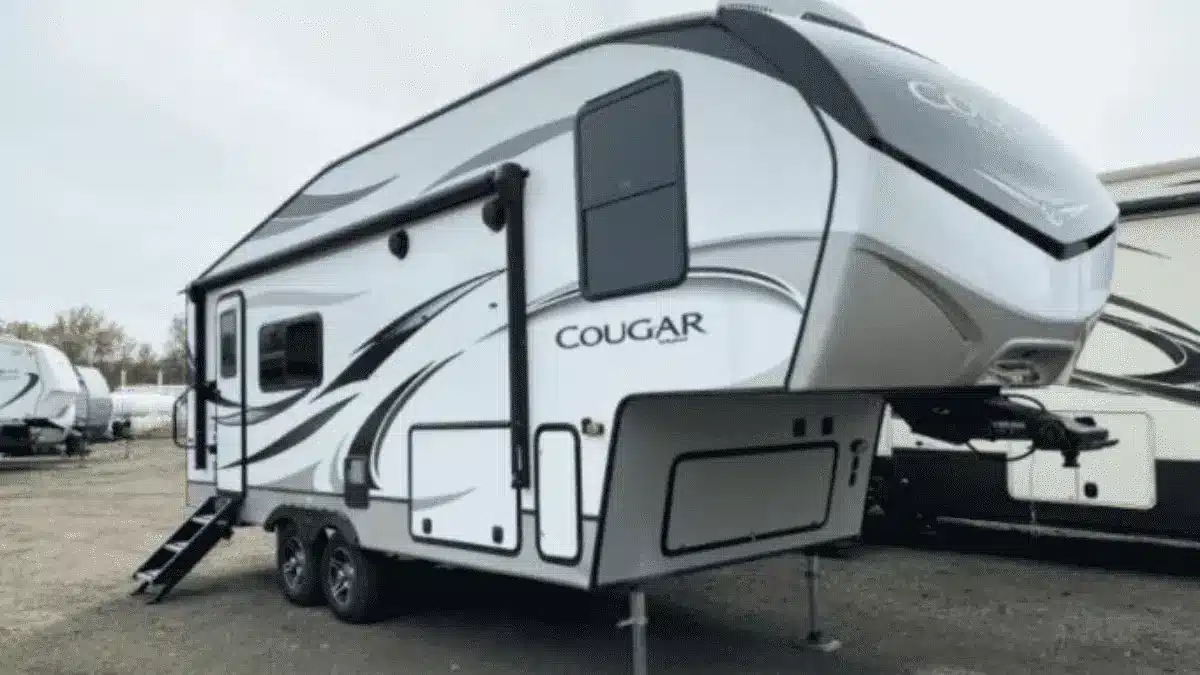 Exterior view of white Cougar 5th Wheel Trailer