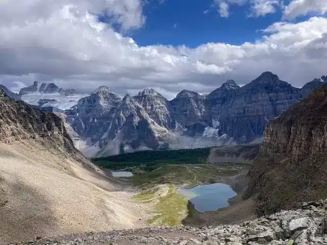 Overhead view of Moraine Lake from Sentinal Pass with beautiful mountain peaks in the background