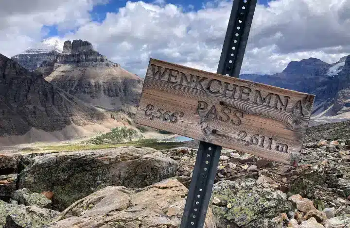 Sign post on hiking trail to Wenkchemna Pass in Banff National Park