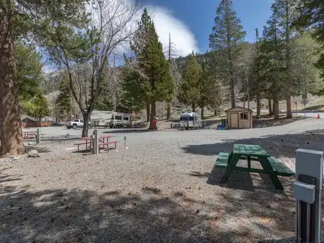 Campsite with picnic table at Golden Pine RV Park in California