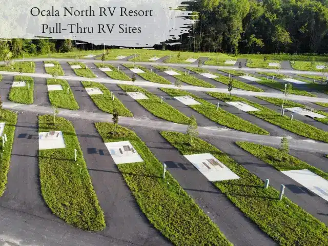 Large, empty pull-thru RV sites at Ocala North RV Resort