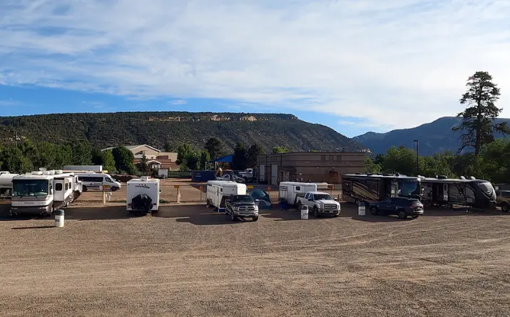 Class A RVs lined up at RV park in Durango Colorado