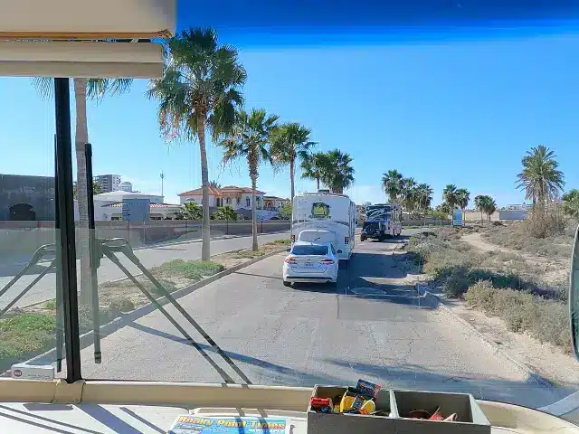 Driver's view of RVs and cars on road