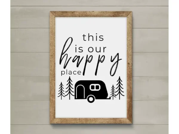 Framed artwork with image of small black and white camper